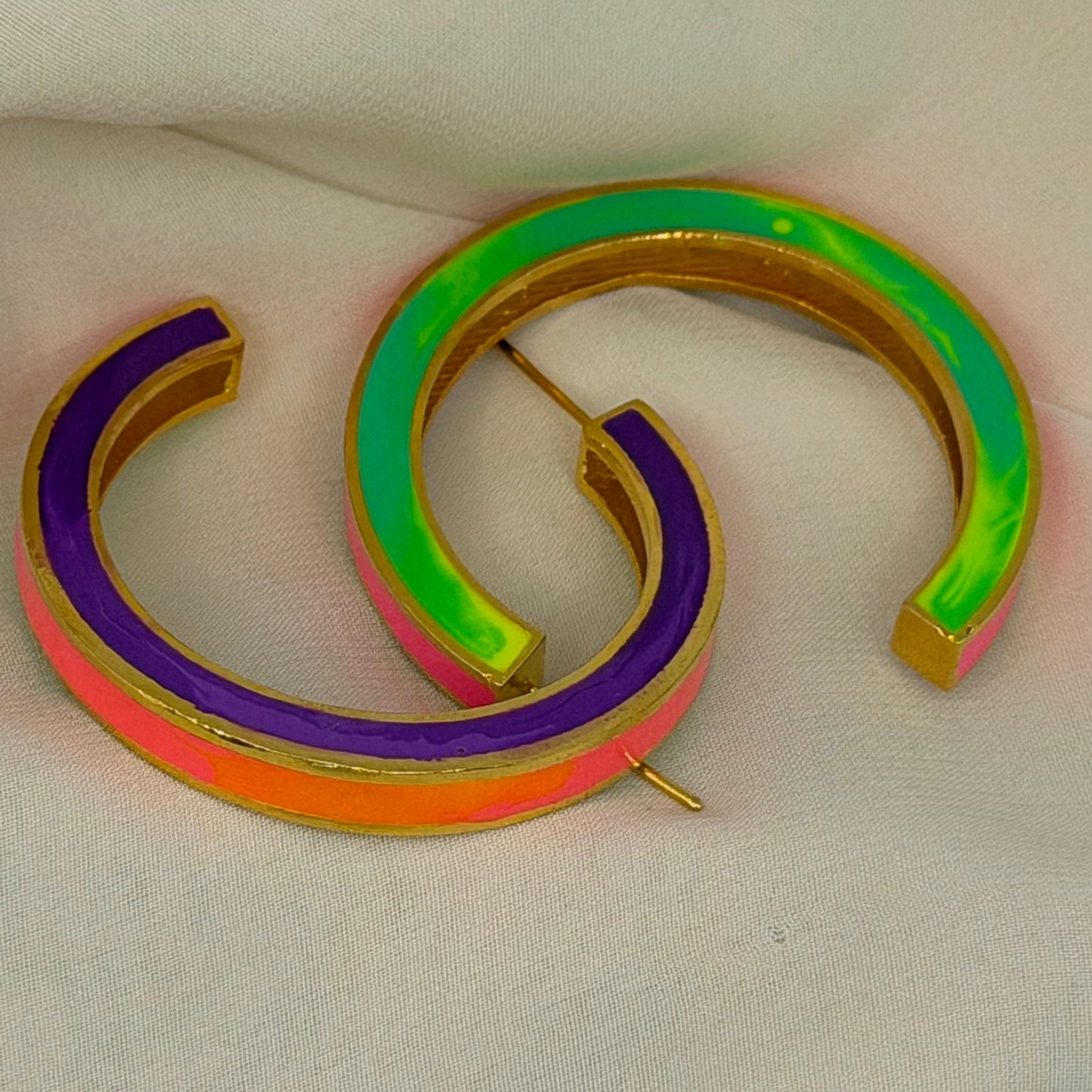 Colorful spiral earring on a white background